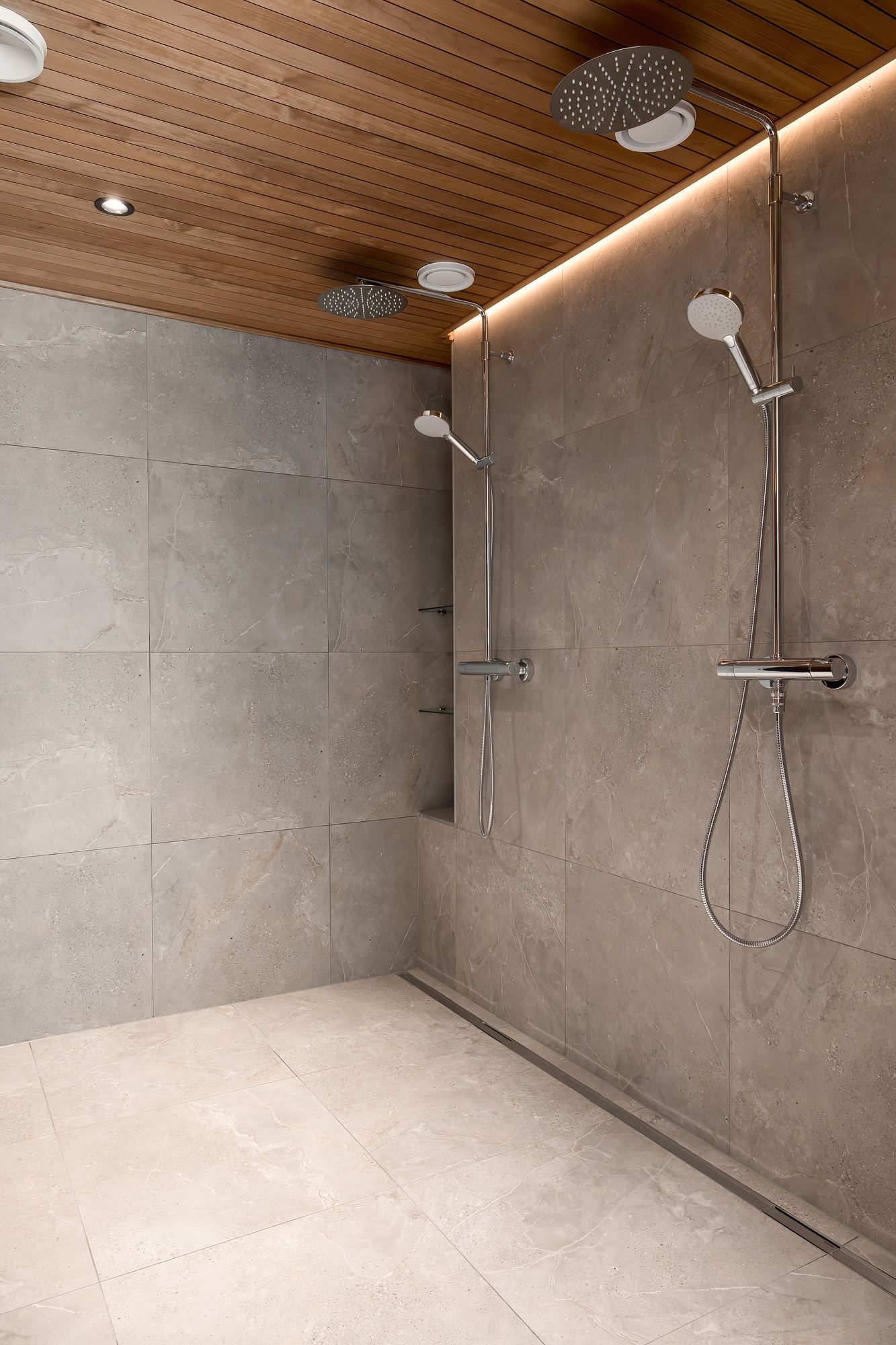A seam of light at the edge of the panelled ceiling in a shower room in Grand